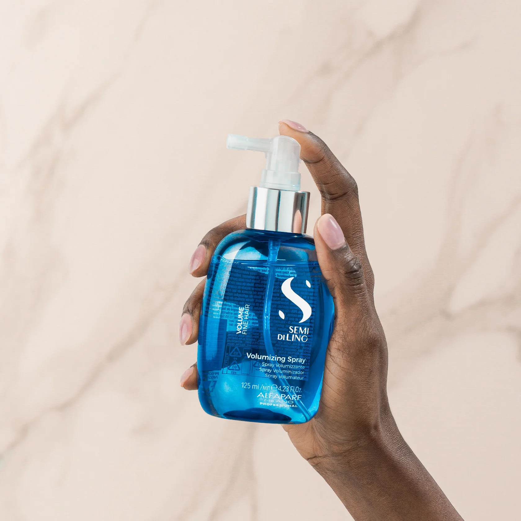 semi_di_lino_alfaparf_spray_volume.webp